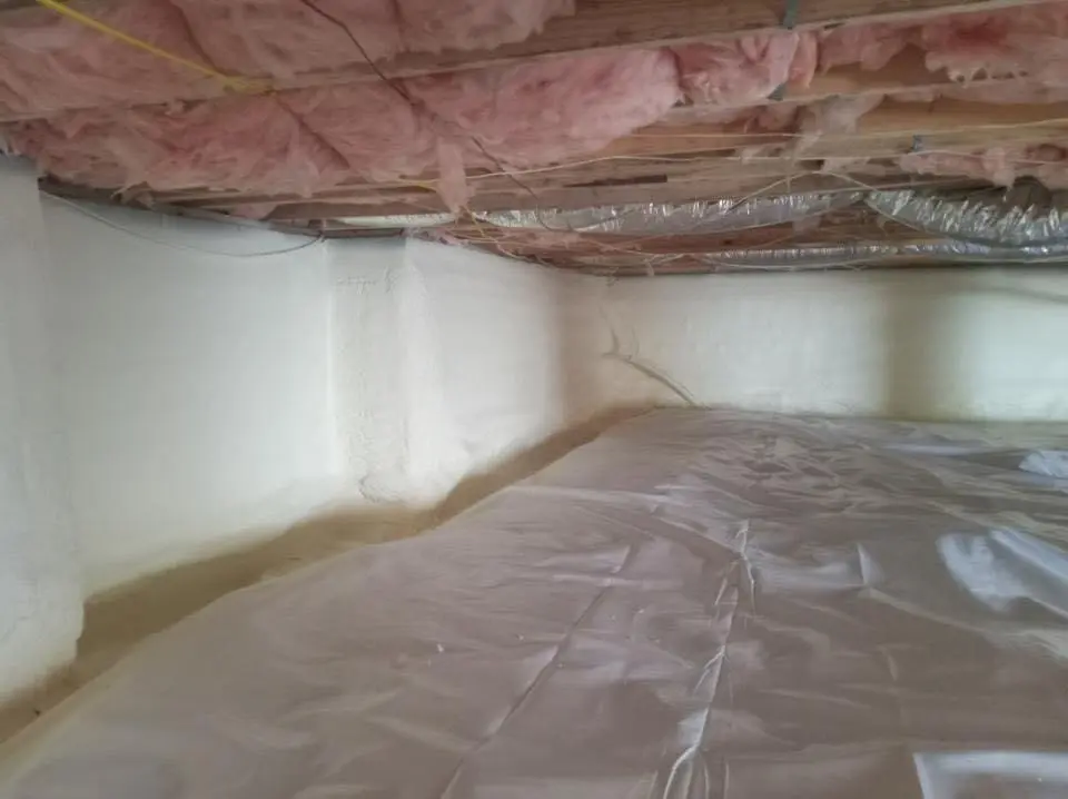 Crawl space encapsulation with closed-cell spray foam for Commercial Roof Restoration in Jennings